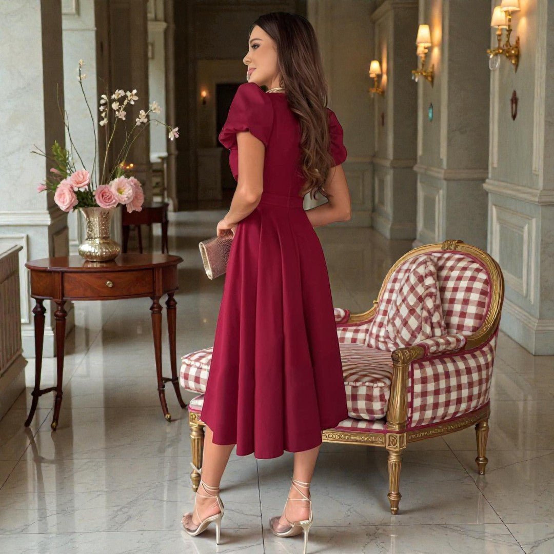 Elegancka sukienka midi z dekoltem v i bufiastymi rękawami na wesele i letnie przyjęcia | Zwiewny letni fason