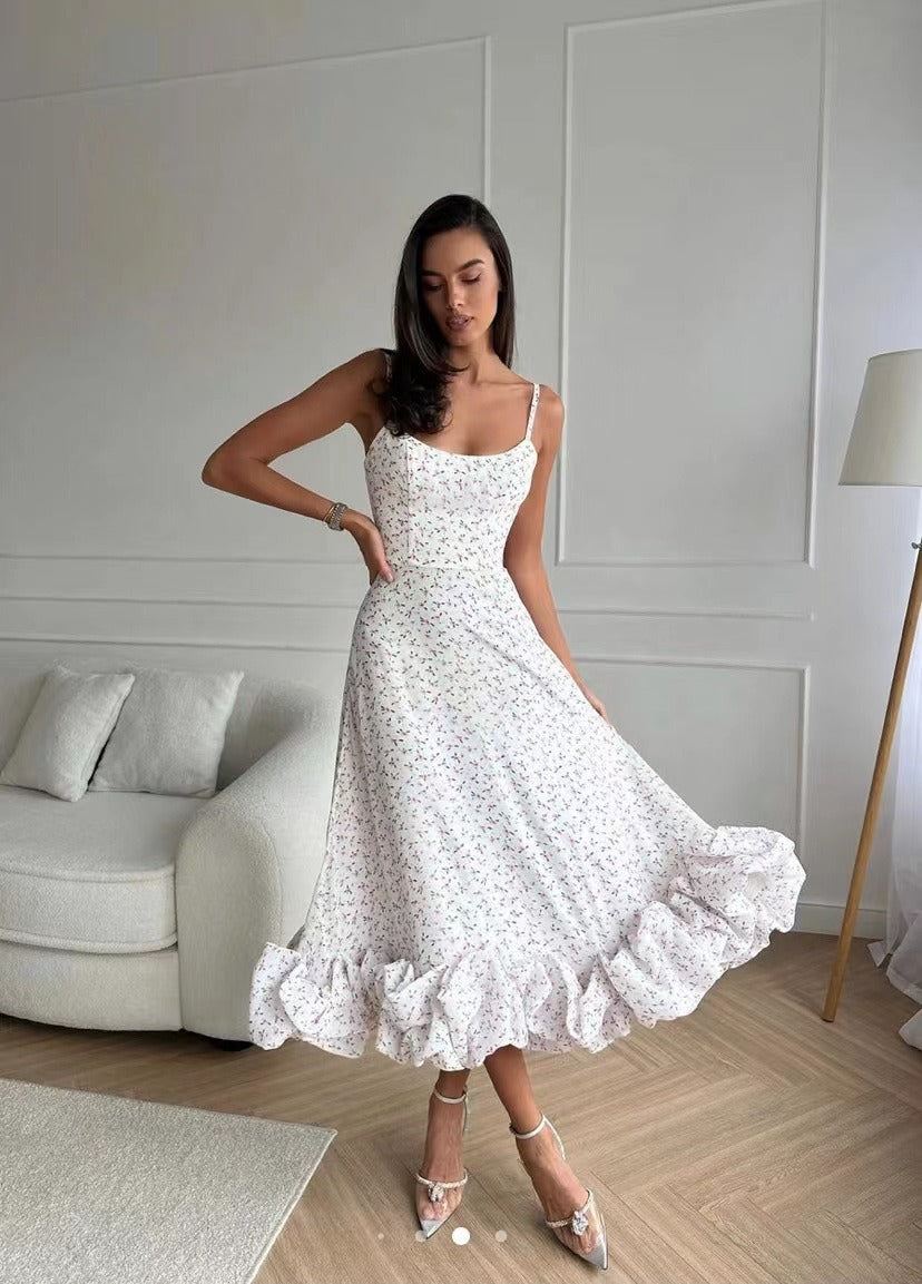 Elegancka midi sukienka wieczorowa z falbanami | Stylowy model na ciepłe dni