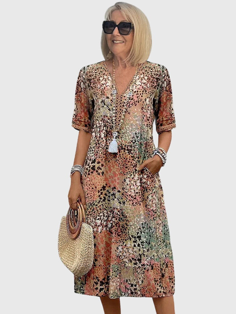Sukienka damska midi w kwiaty - elegancka sukienka na wesele i letnie dni | Stylowy model na ciepłe dni