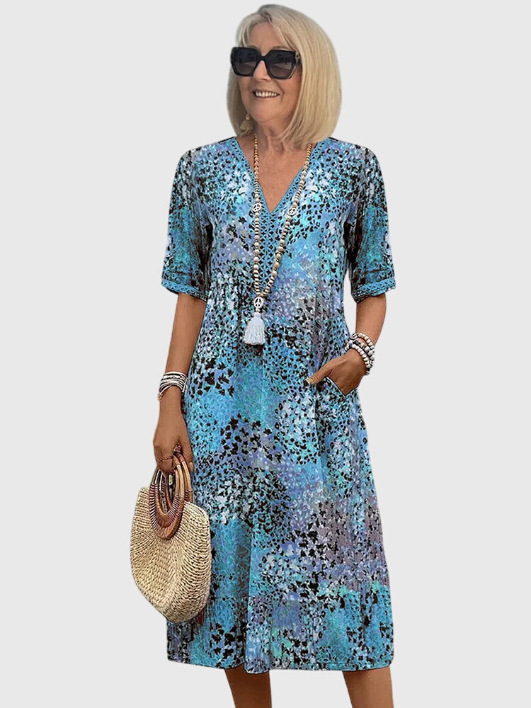 Sukienka damska midi w kwiaty - elegancka sukienka na wesele i letnie dni | Stylowy model na ciepłe dni