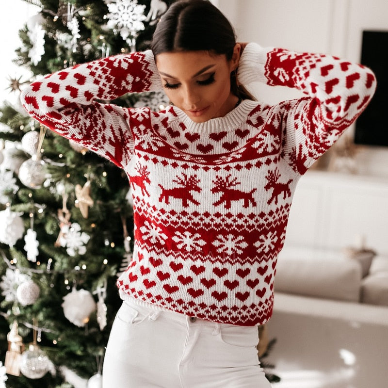 Damski sweter świąteczny w śnieżynki i renifery